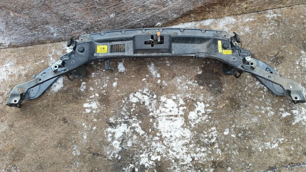 Top upper radiator support slam panel