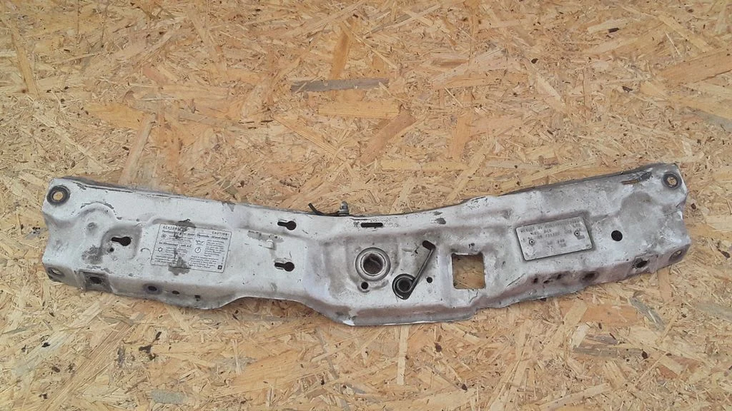 Top upper radiator support slam panel