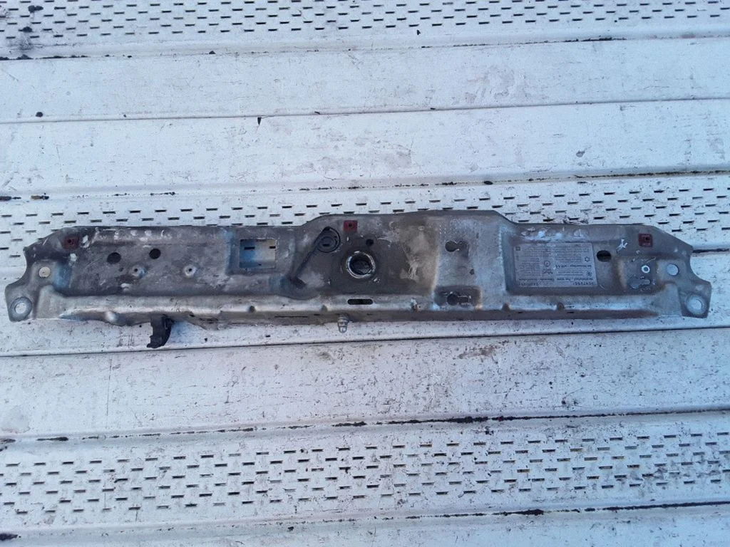 Top upper radiator support slam panel