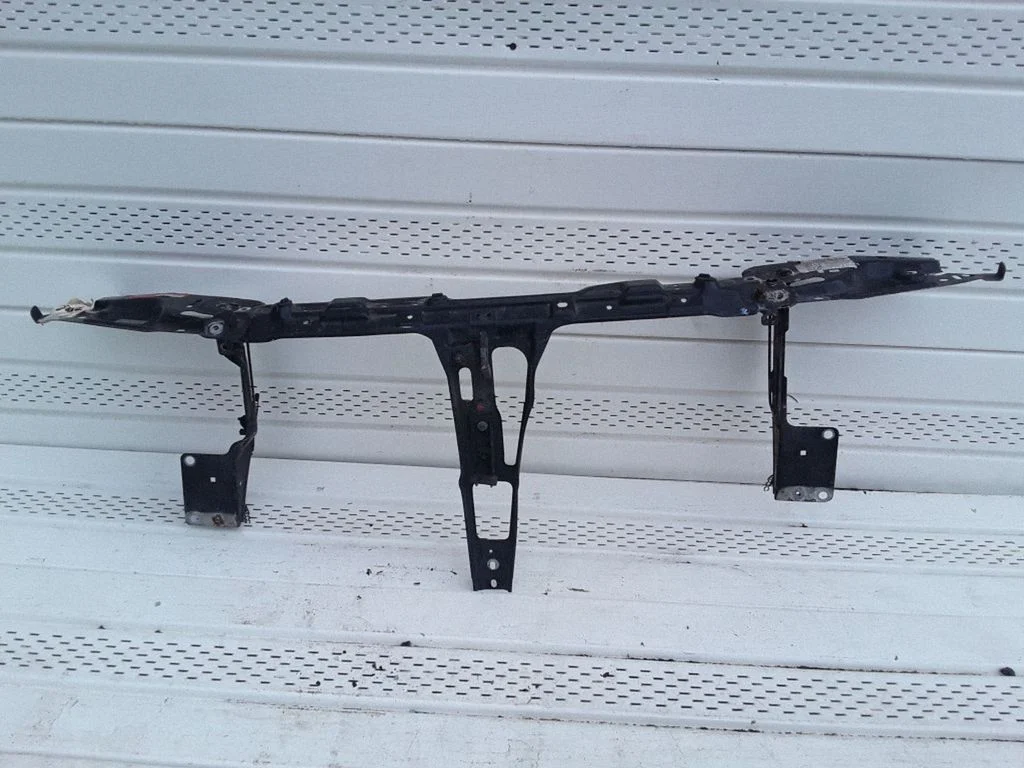 Top upper radiator support slam panel