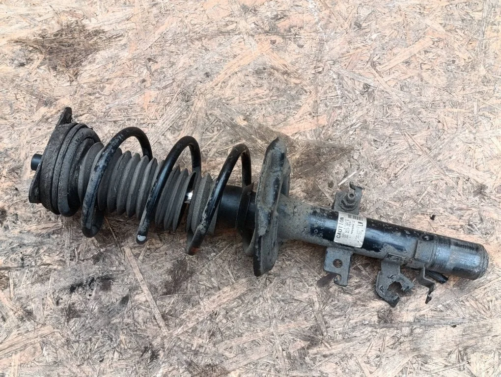 Front shock absorber with coil spring 543034EA3A