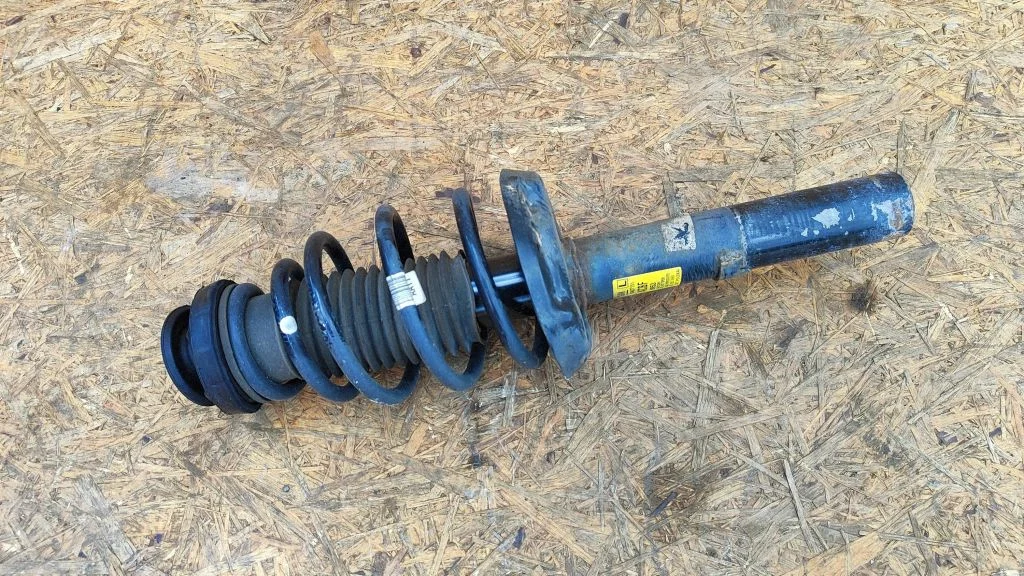 Front shock absorber with coil spring 13427151 – Opel Cascada (2013-)