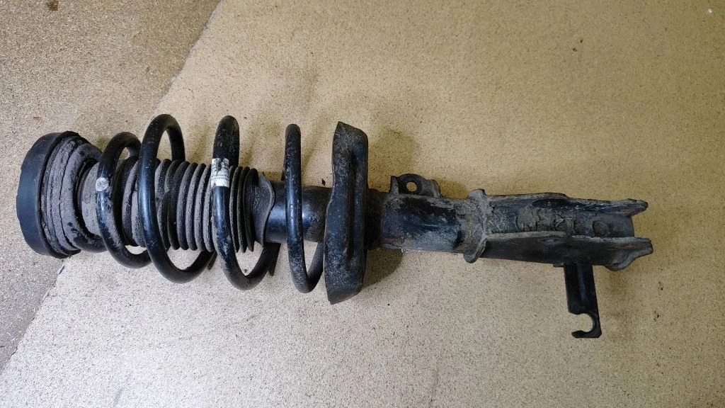 Front shock absorber with coil spring – Opel Insignia A (2008-2017)