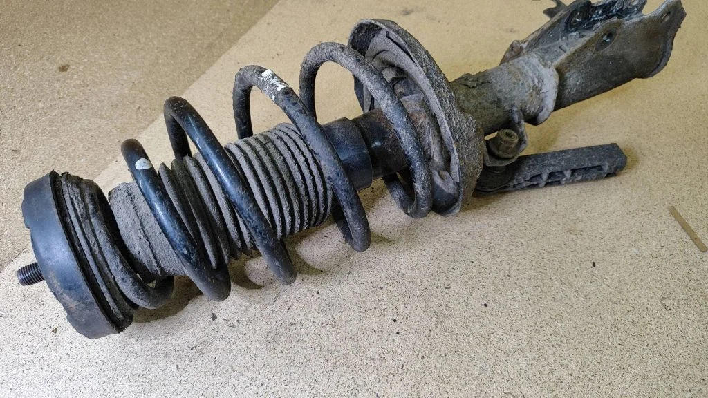 Front shock absorber with coil spring – Opel Insignia A (2008-2017)