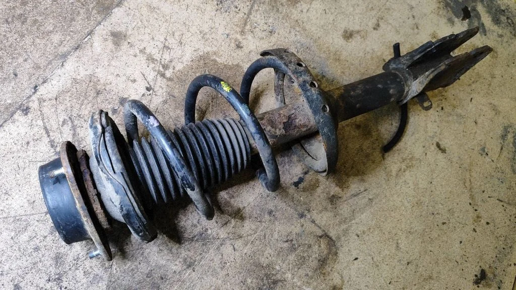 Front shock absorber with coil spring – right