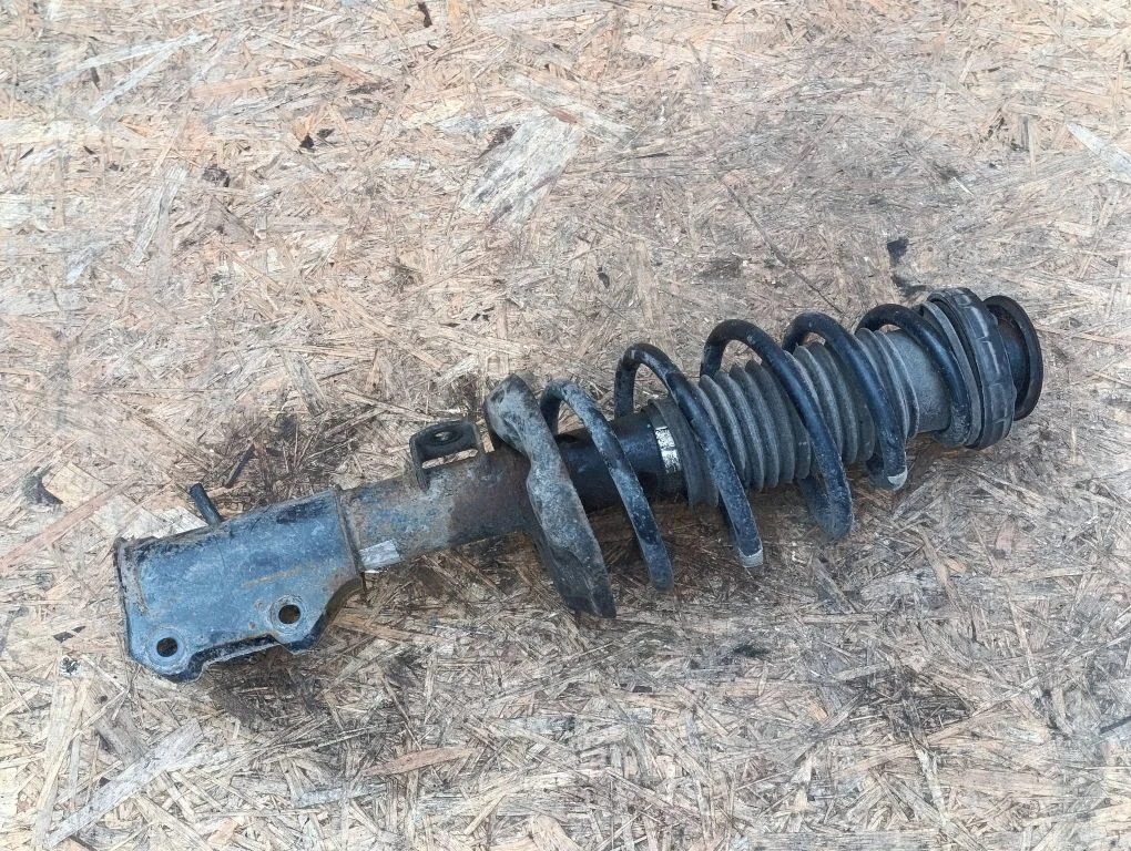Front shock absorber with coil spring – Opel Astra J (2010-2015)