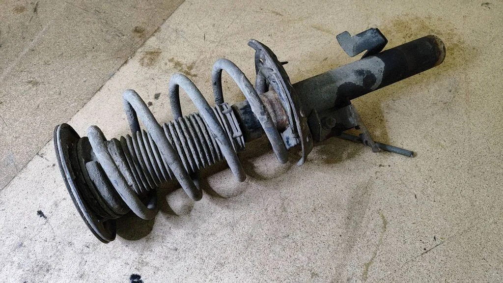 Front shock absorber with coil spring – right