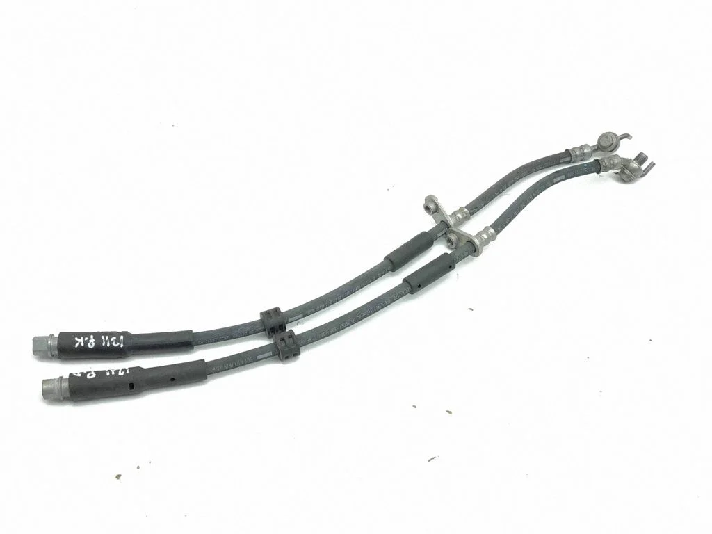 Brake booster pipe/hose – front