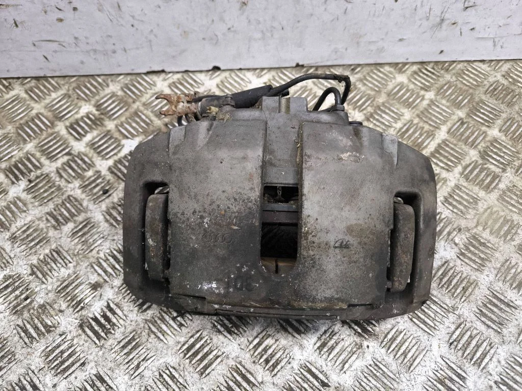 Front brake caliper – left