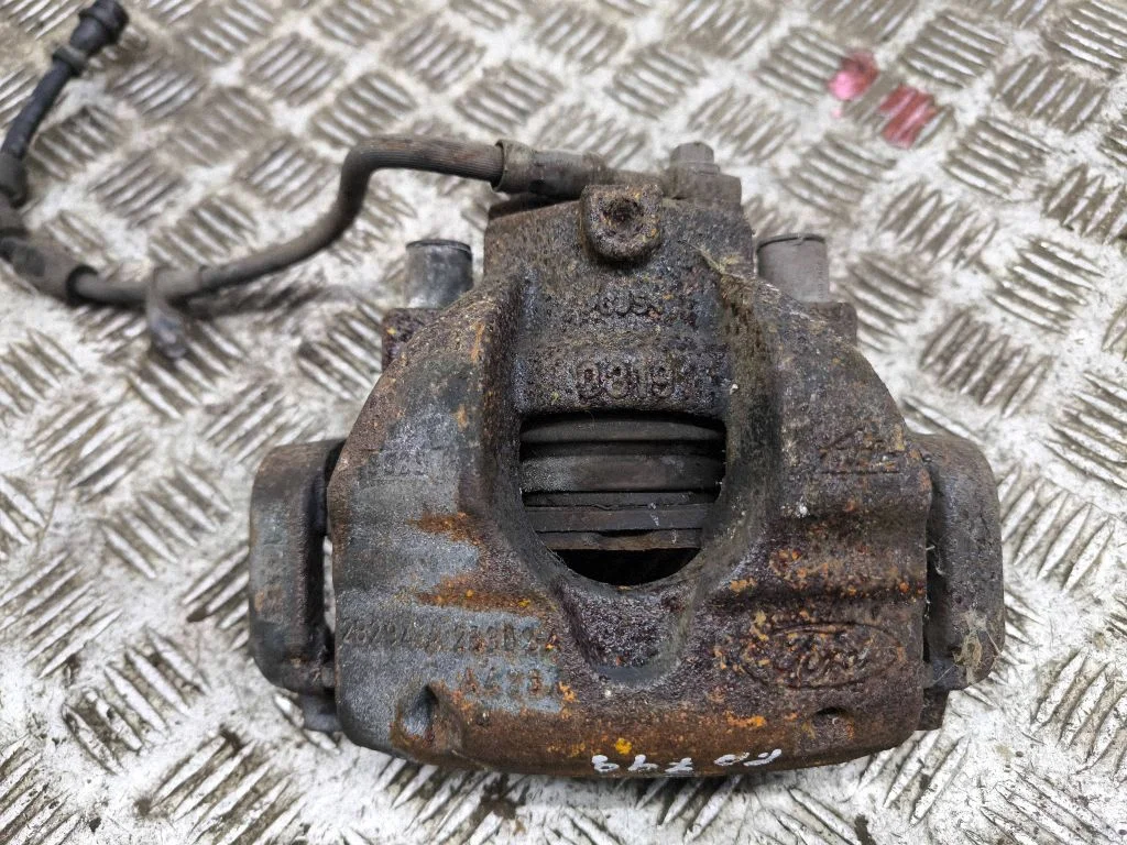 Front brake caliper – right