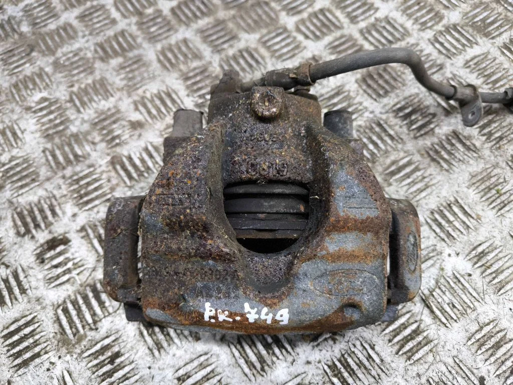 Front brake caliper – left