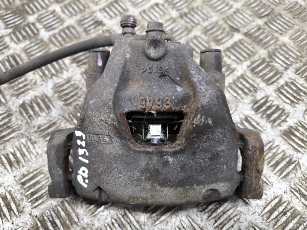 Front brake caliper – right