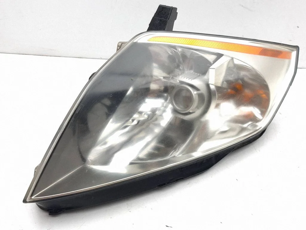 Headlight/headlamp – left