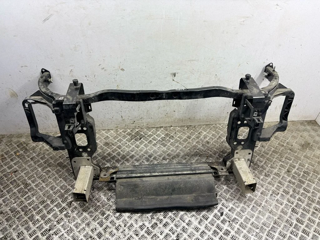 Radiator support slam panel
