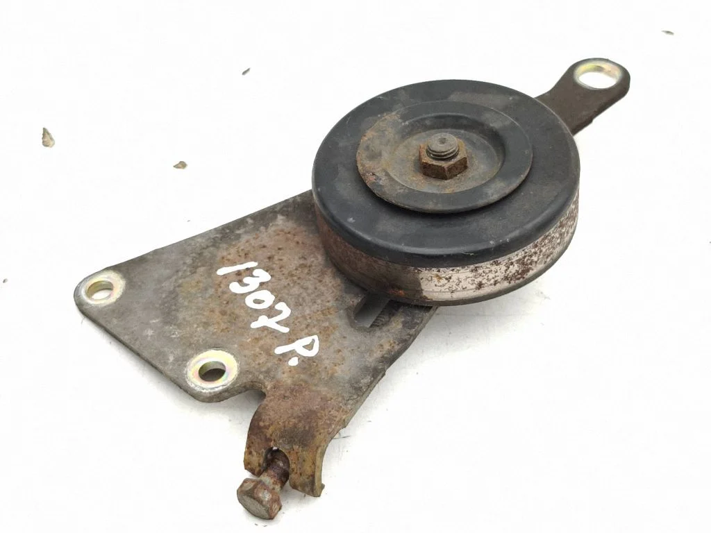 Generator/alternator belt tensioner