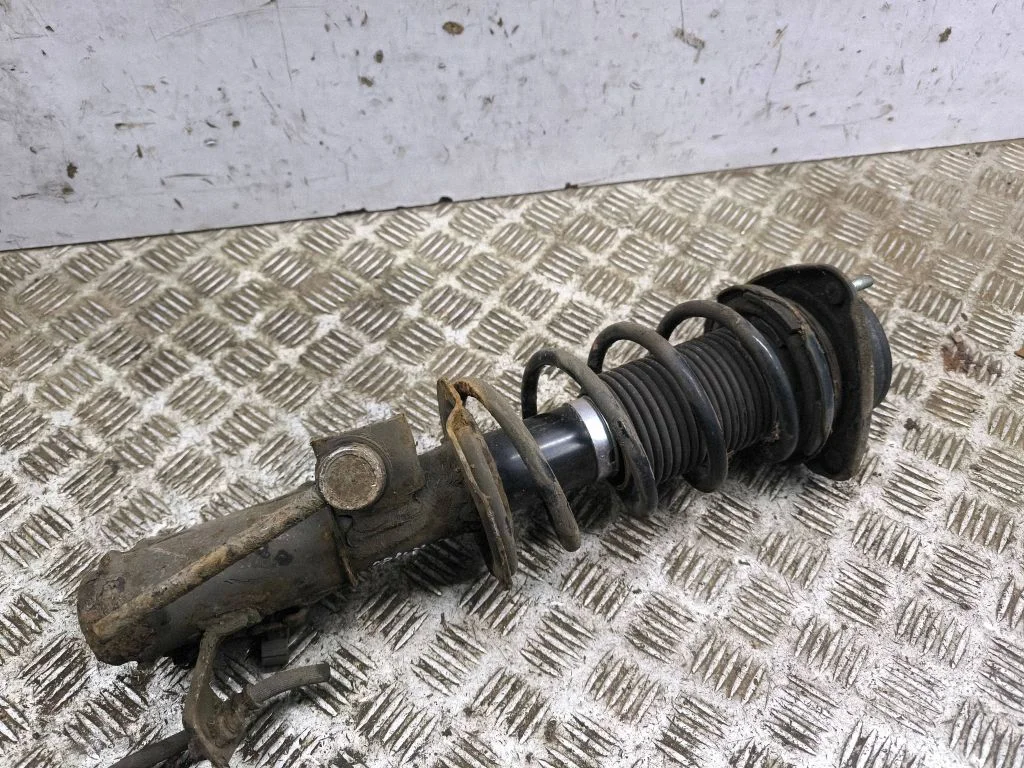 Front shock absorber/damper 20310CA010
