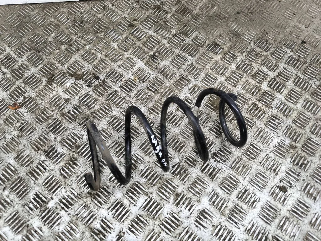 Front coil spring – left