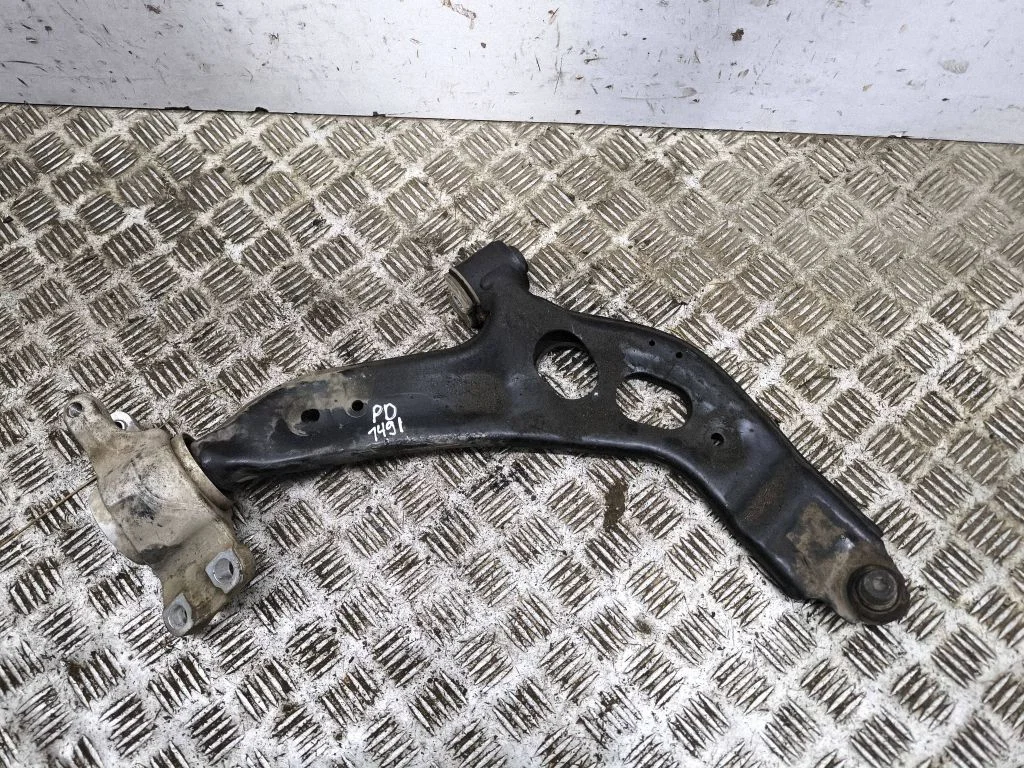 Front lower control arm/wishbone 242692700