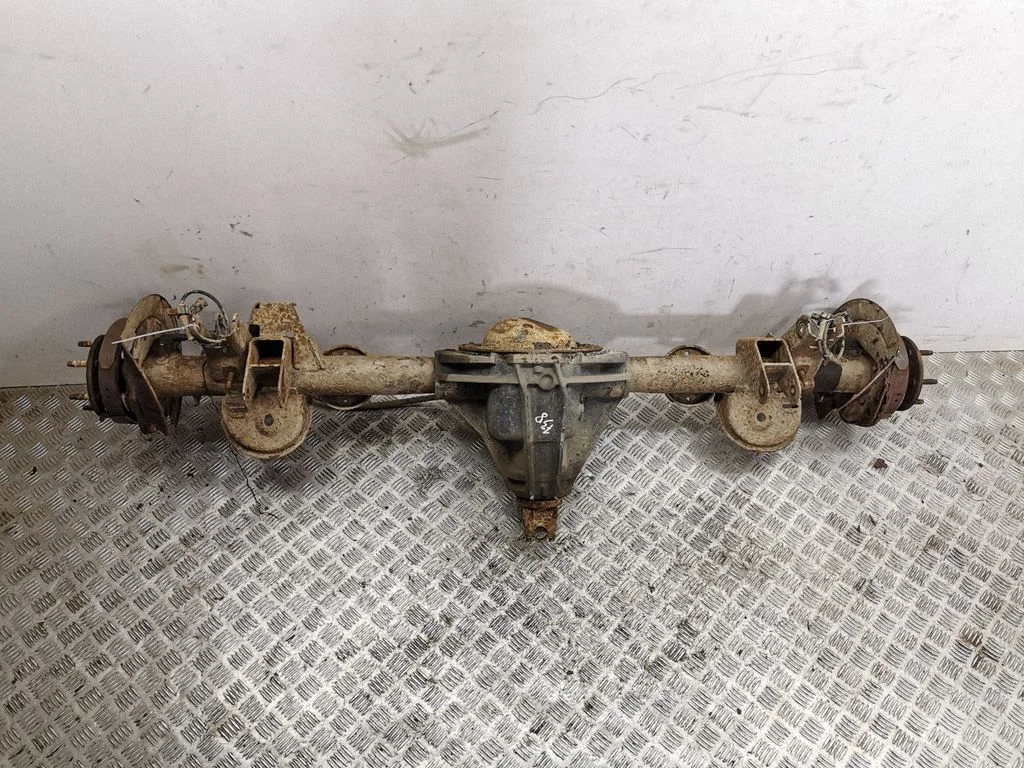 Rear axle beam with reductor