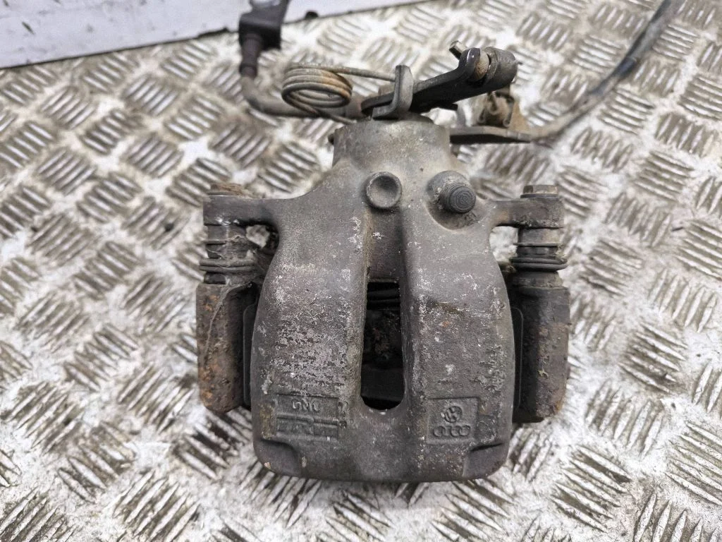 Rear brake caliper – right