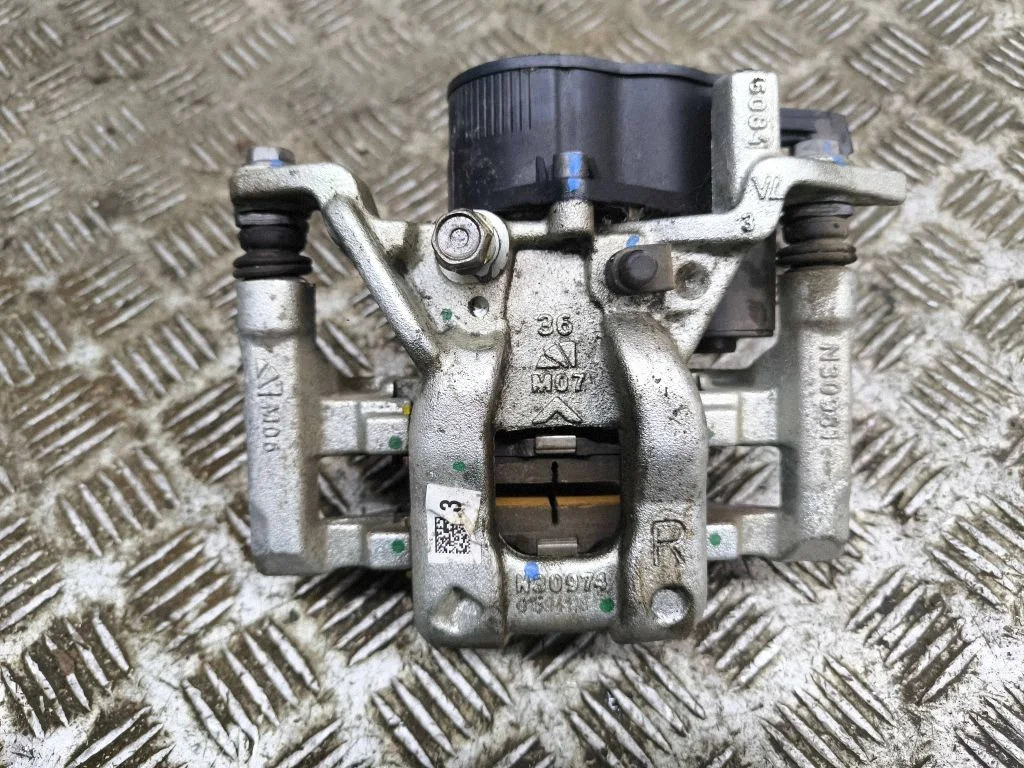 Rear brake caliper – right