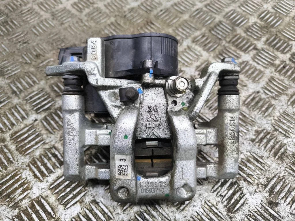 Rear brake caliper – left
