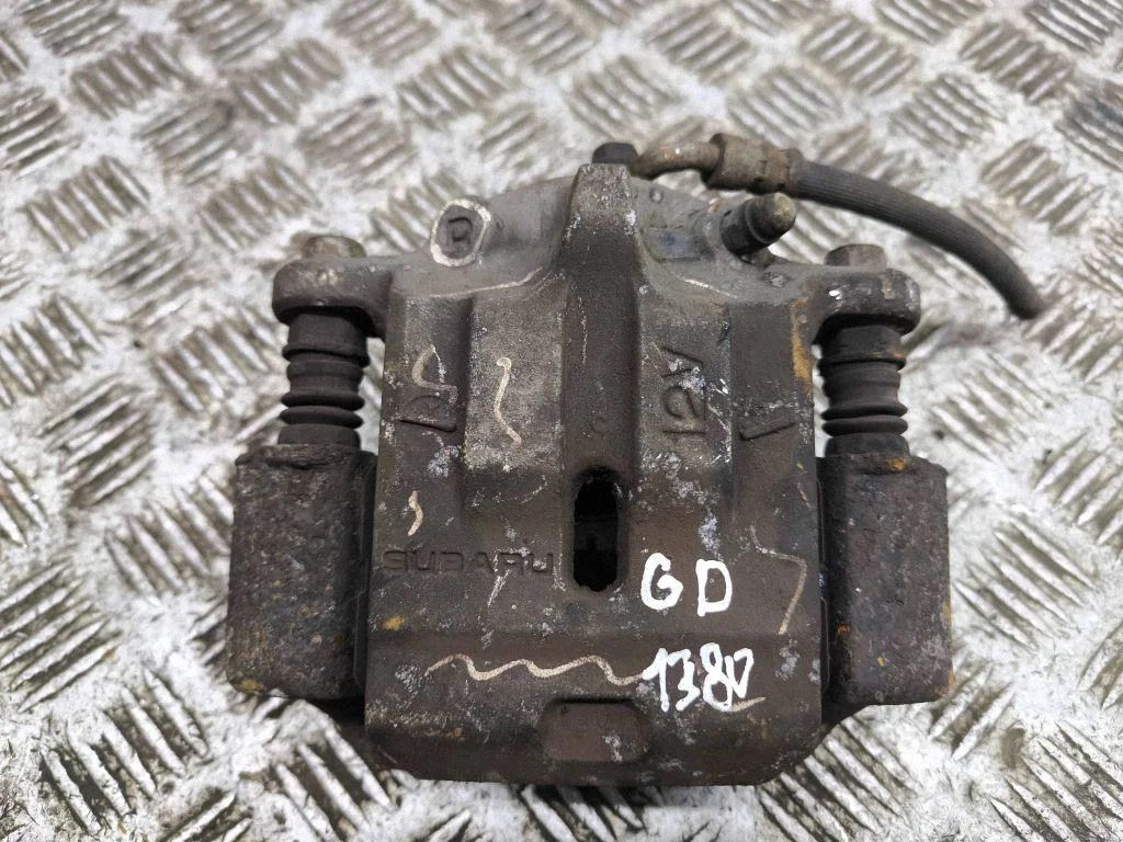 Rear brake caliper – right