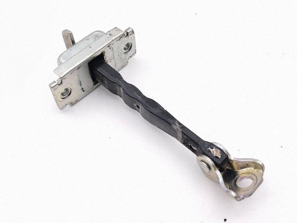Front door check strap stopper – right