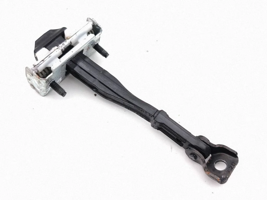 Front door check strap stopper – left