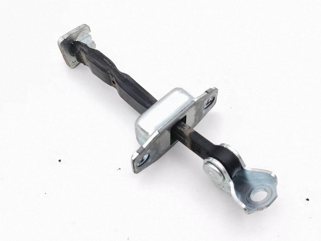 Rear door check strap stopper – right