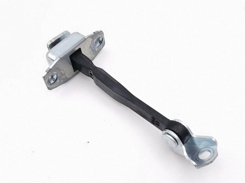 Rear door check strap stopper – left