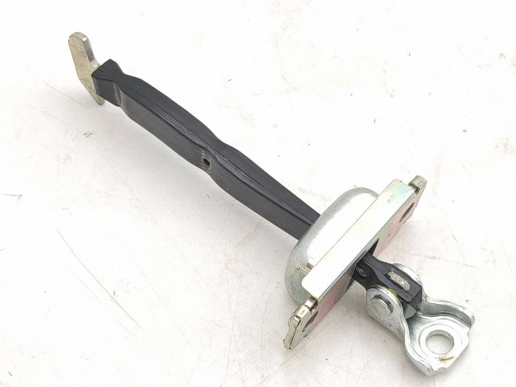 Rear door check strap stopper – right