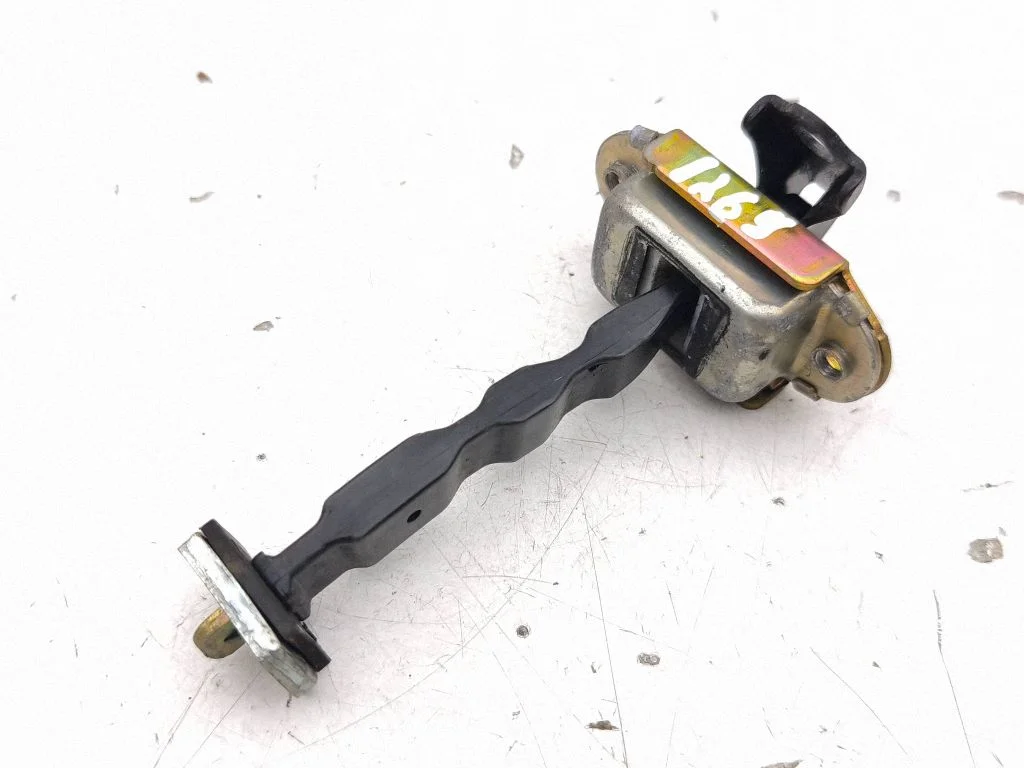 Front door check strap stopper – left