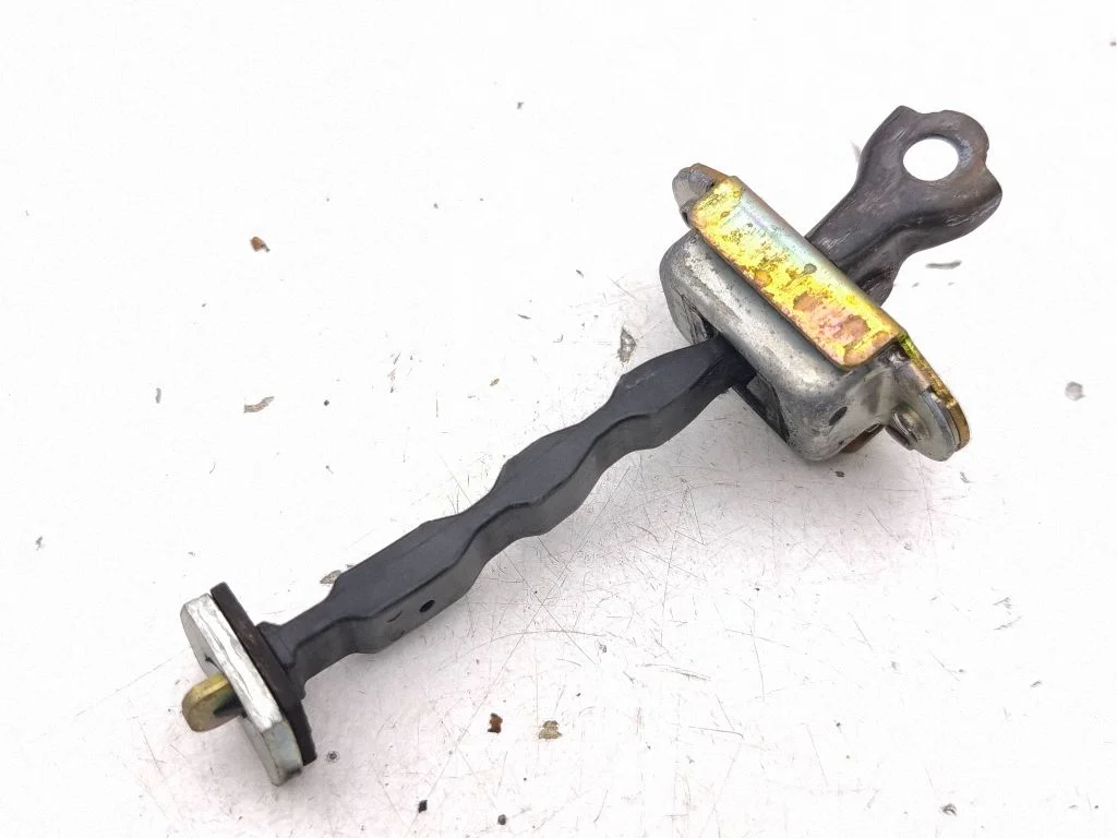 Front door check strap stopper – right