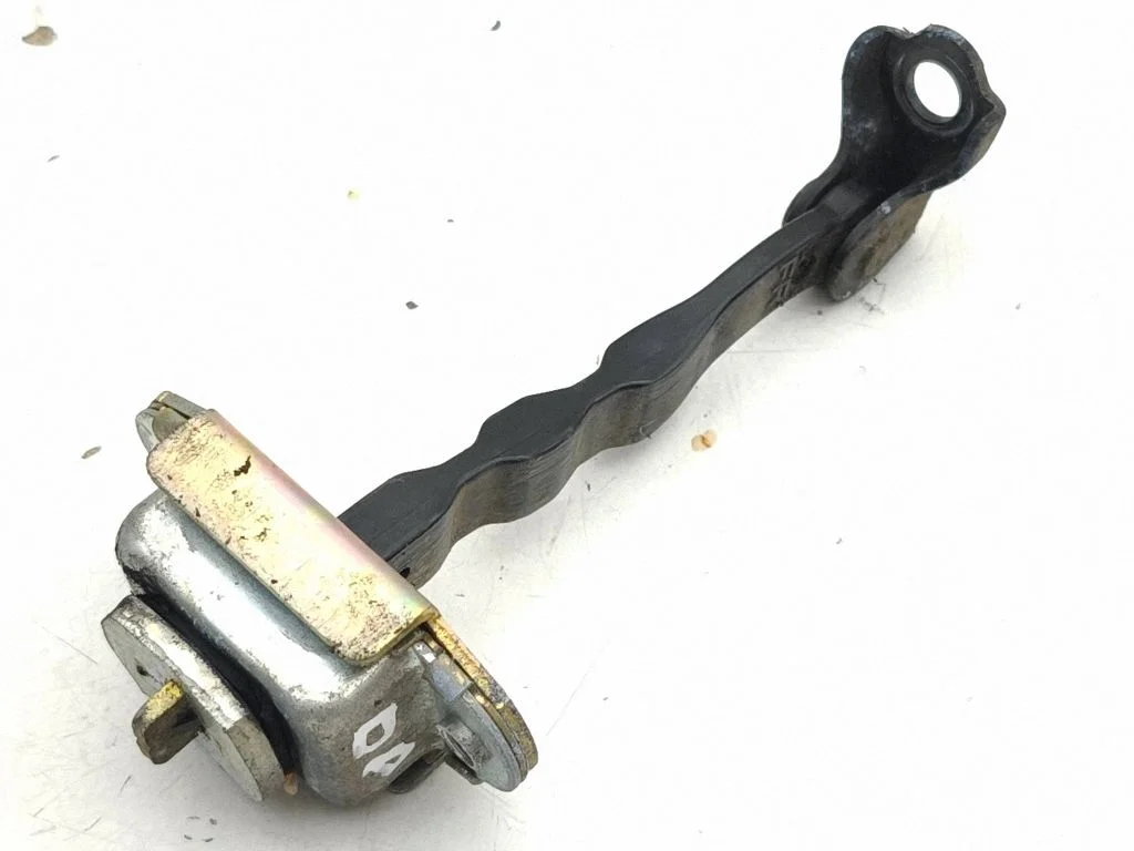 Front door check strap stopper – right
