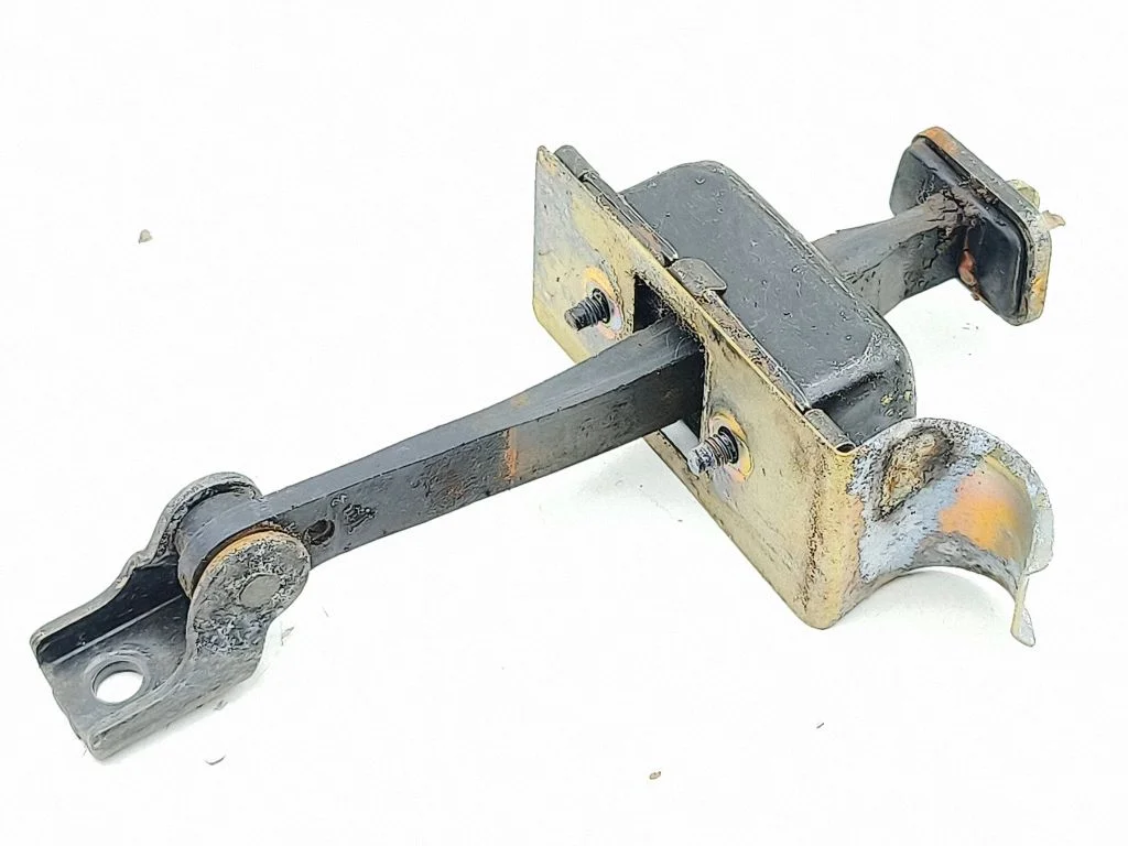 Front door check strap stopper – right