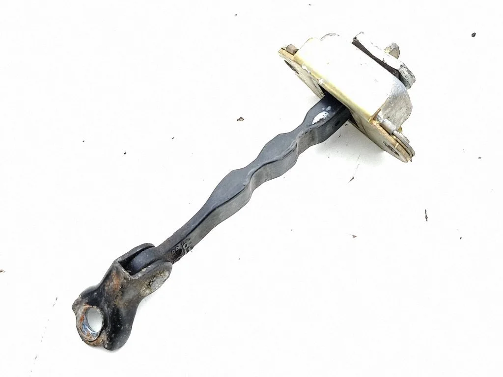 Front door check strap stopper – right