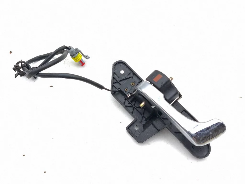Front door interior handle – left