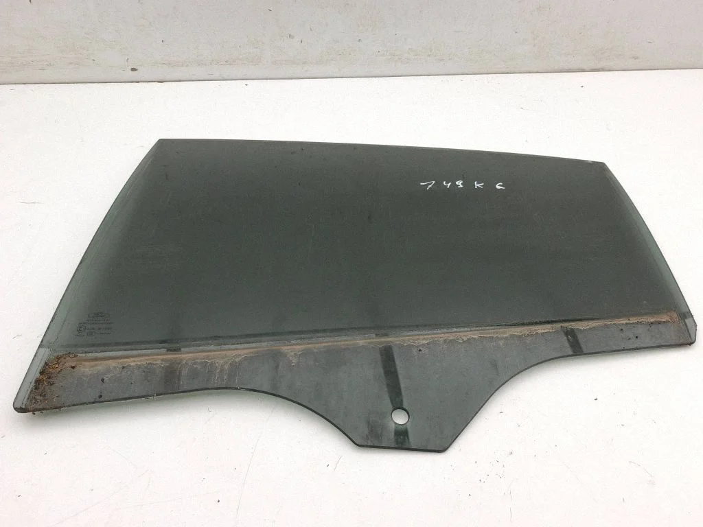 Rear door window glass – left