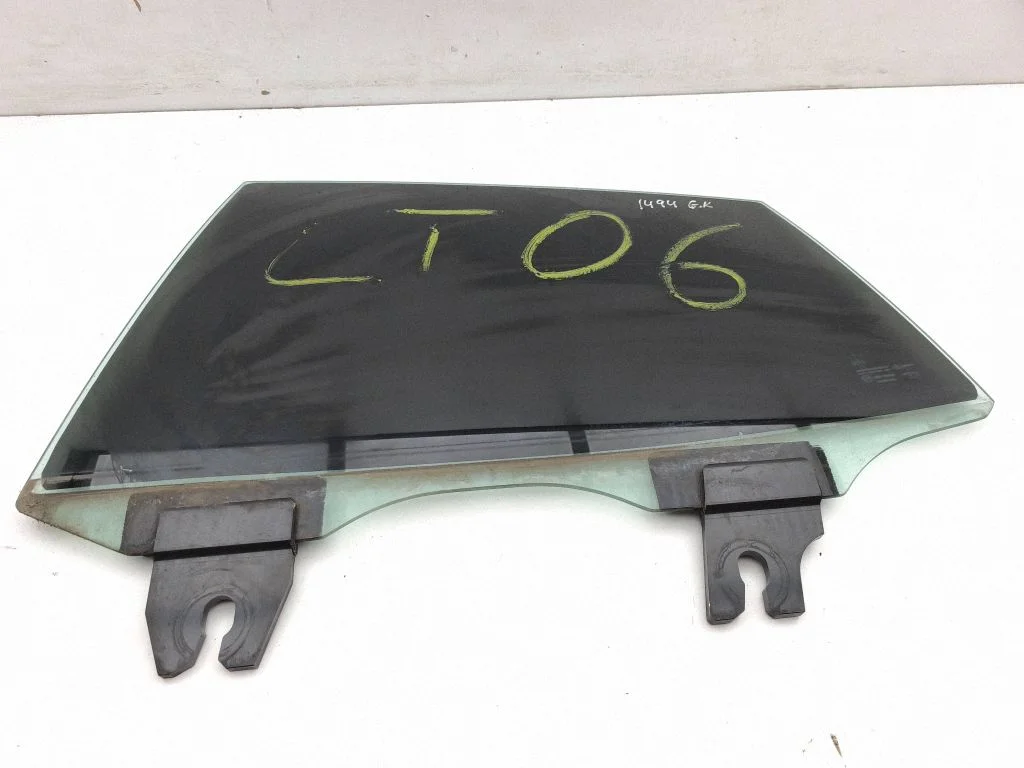 Rear door window glass – left