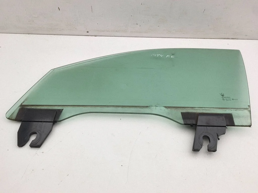Front door window glass four-door – left
