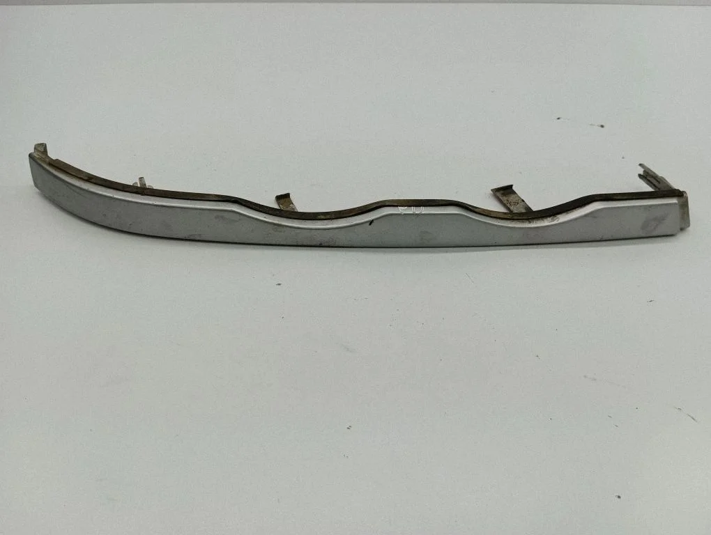 Under headlight/headlamp trim 8208432