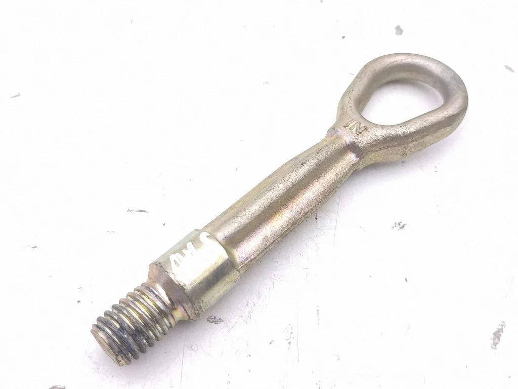 Towing hook eye