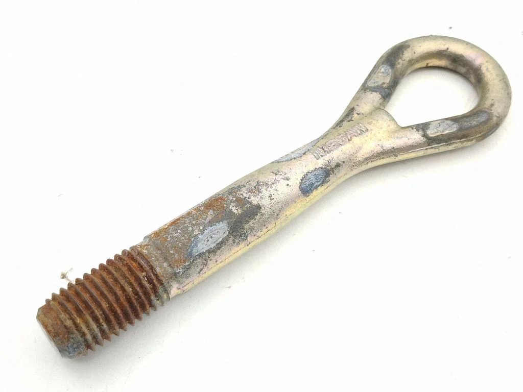 Towing hook eye