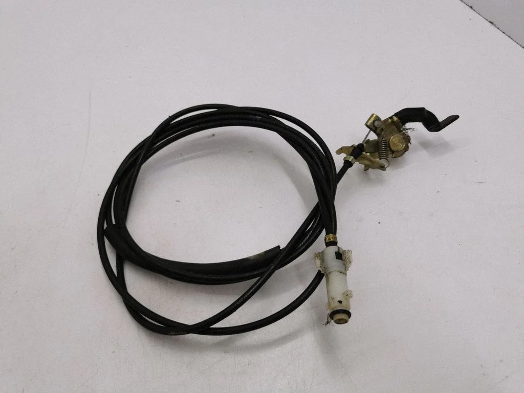 Fuel cap flap release cable