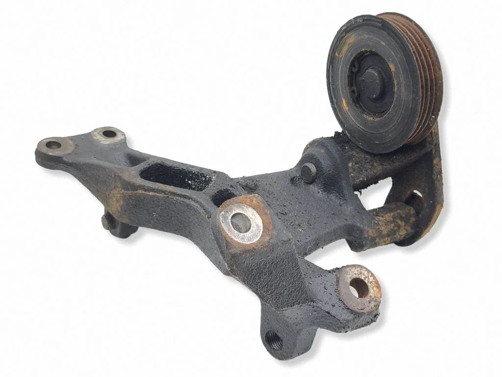 Alternator belt tensioner