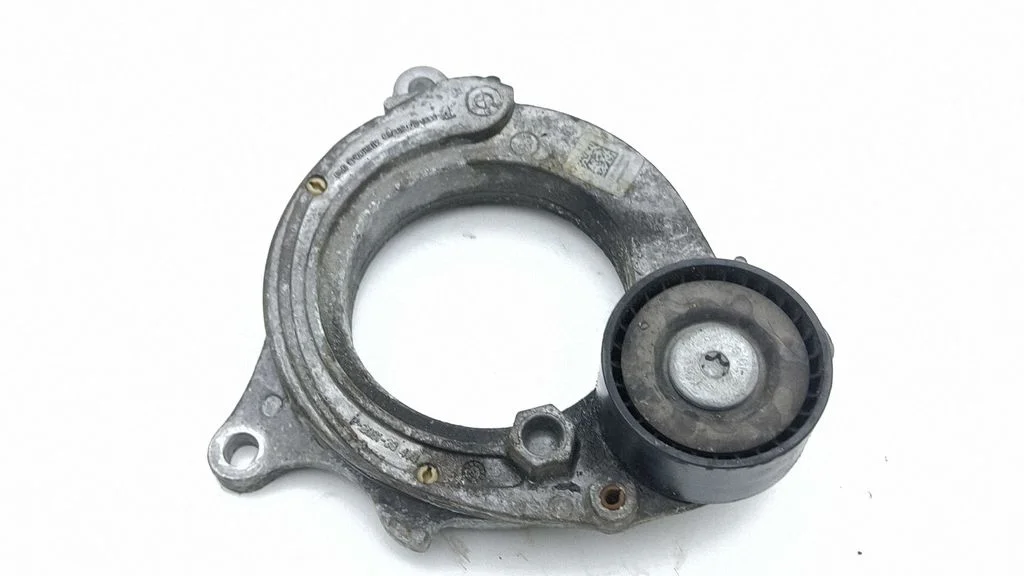 Alternator belt tensioner