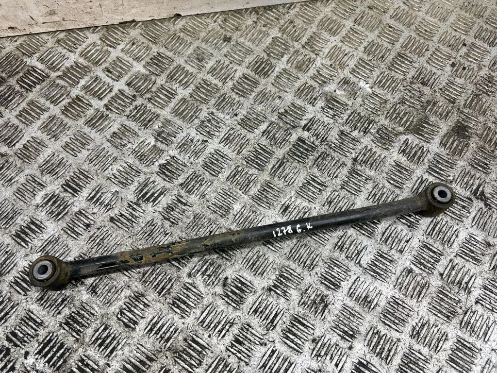 Rear traction arm rod – left