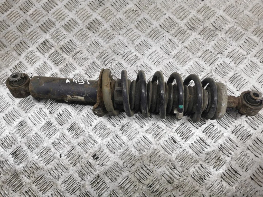 Rear shock absorber with coil spring – left