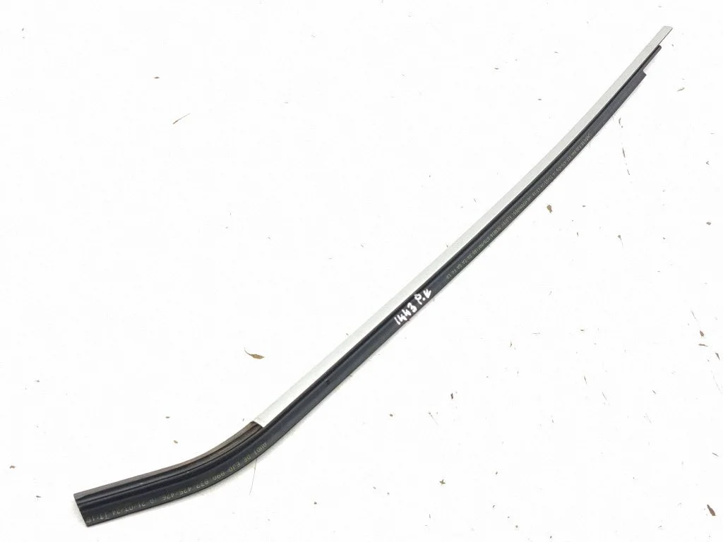 Front door glass trim molding 89A837475